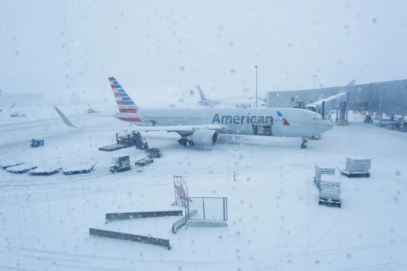 American airlines offer flyers FREE winter storm lifeline as 'catastrophic' weather front sparks travel chaos