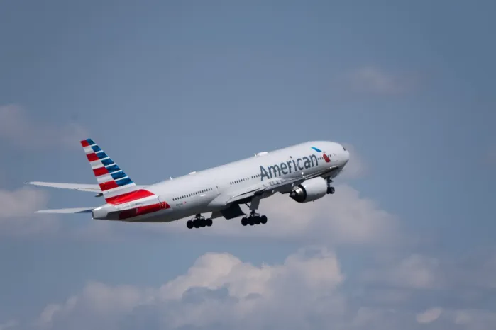 Passenger Demands $7,000 After American Airlines Spills Wine On Louis Vuitton Bag—Doxes FligҺt Attendant On TiƙToƙ